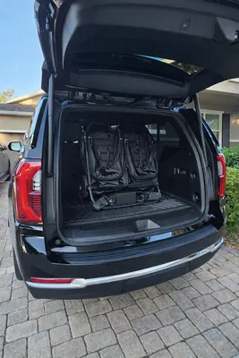 Double stroller conveniently loaded in the trunk of a Majestic vehicle