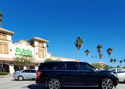Majestic driver loading groceries for a family's airport pickup